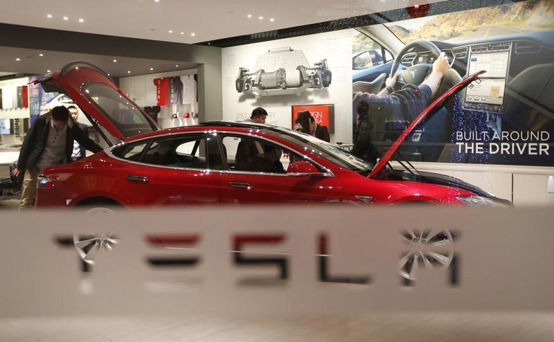CFRA Raises Estimates on Tesla as Inflation Bill Cuts Competition