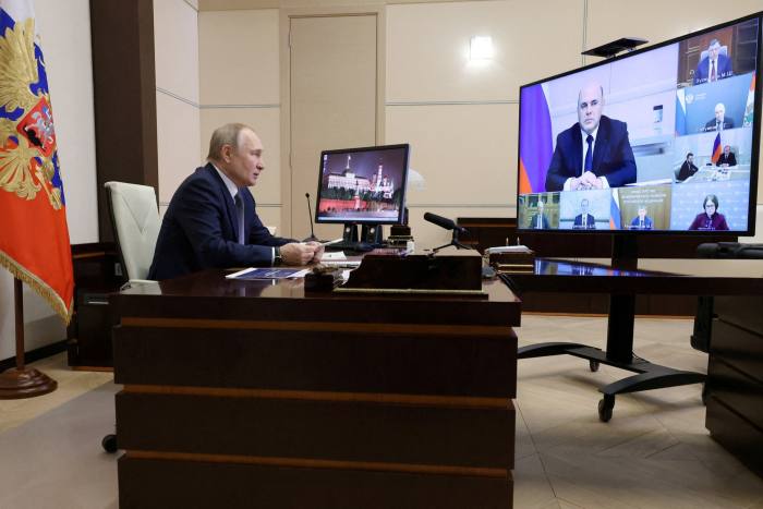 Russian President Vladimir Putin chairs a meeting on economic issues, via a video link