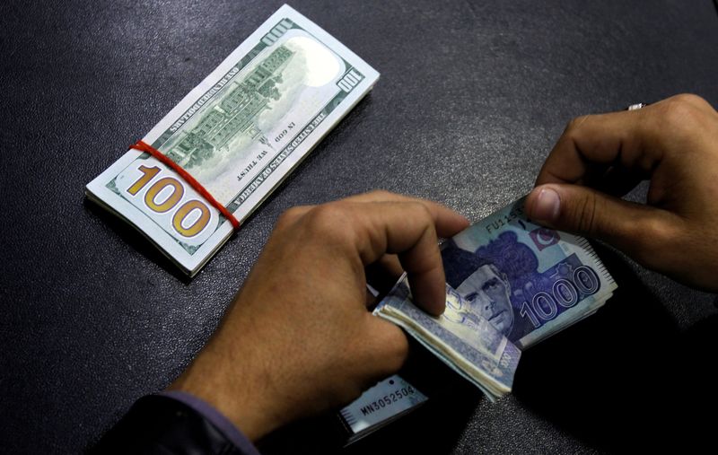 Pakistani rupee falls after market maker group removes currency cap