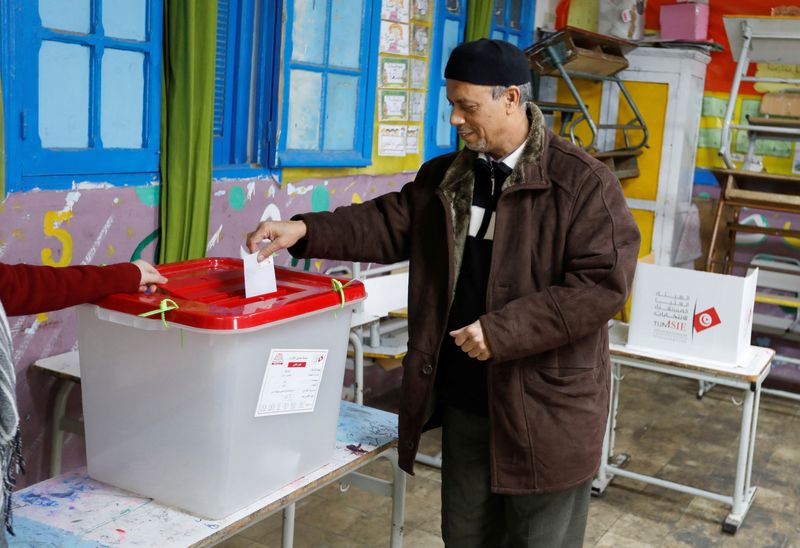 Polls open in Tunisian election with turnout under scrutiny