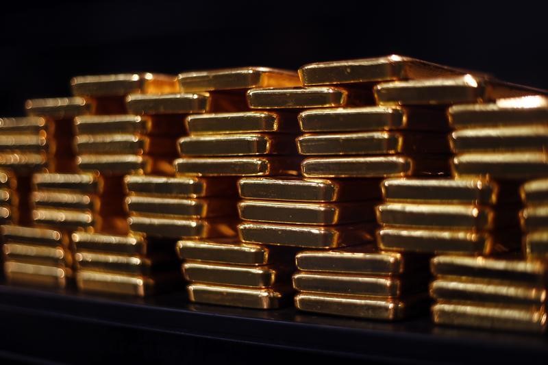 Gold pinned near $2,000, overtakes dollar as premier safe haven