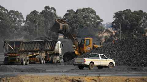 Coal being loaded on to a truck at a Glencore colliery in South Africa in 2015