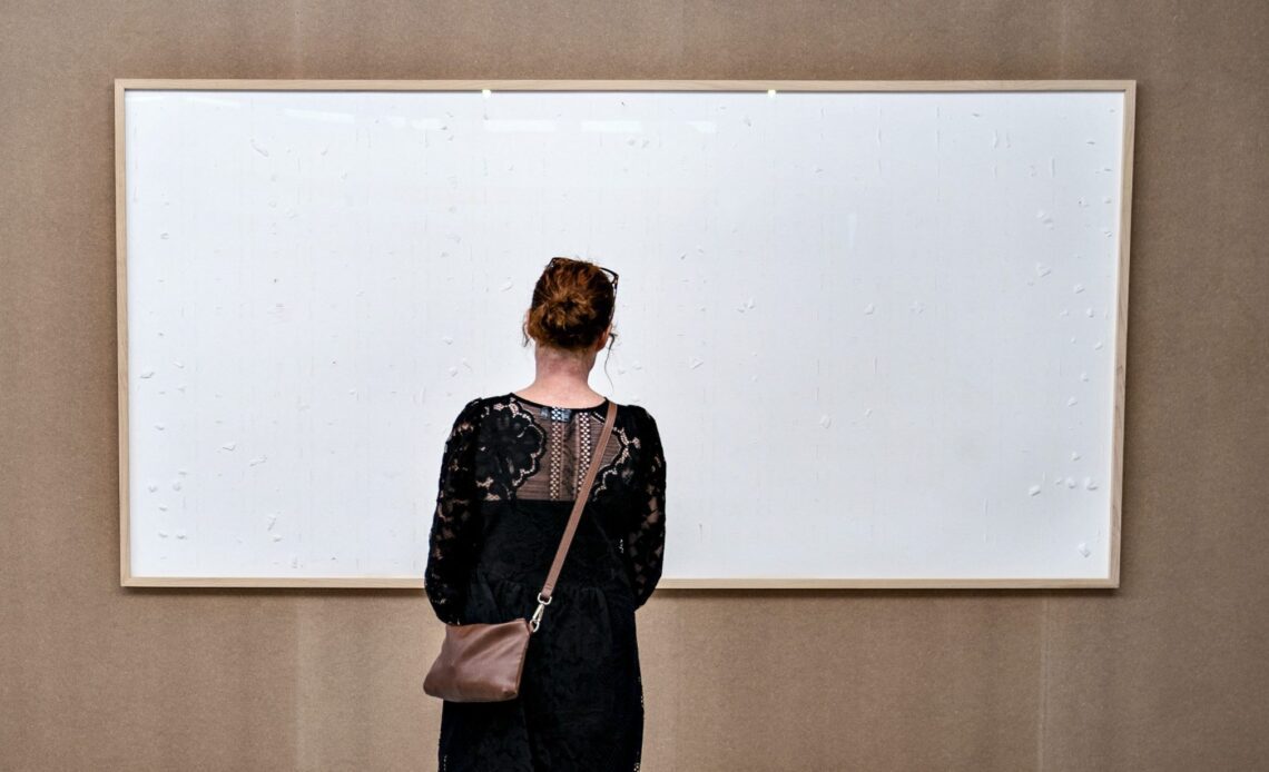Artist to pay museum $77,000 for submitting 2 blank canvases
