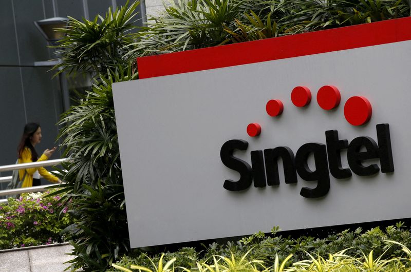 Singtel sees $2.3 billion impairment hit, net loss in 2024 second-half By Reuters