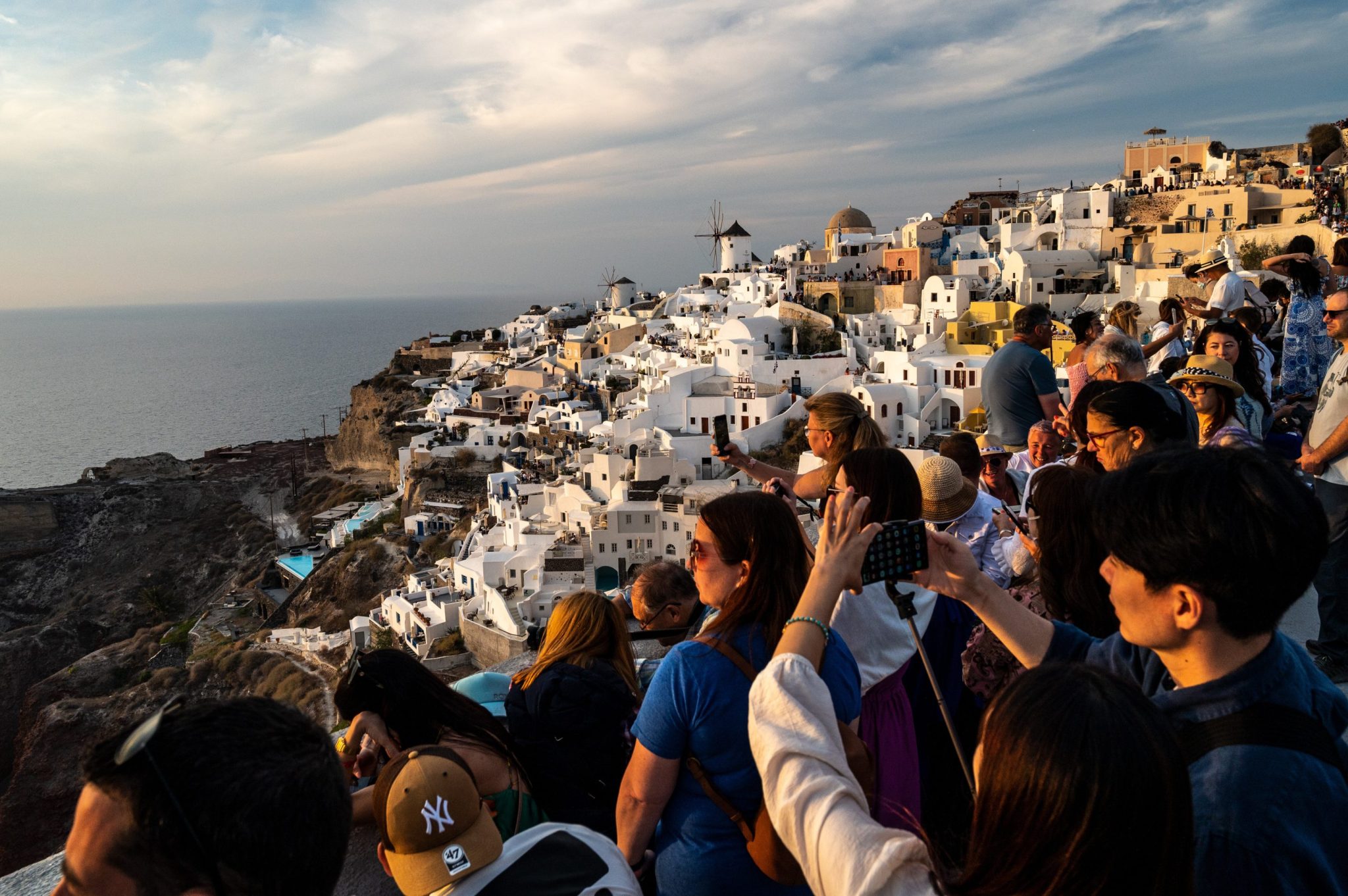 Tourism has hijacked Santorini's wine production as agricultural land becomes exorbitant while visitor numbers continue to climb