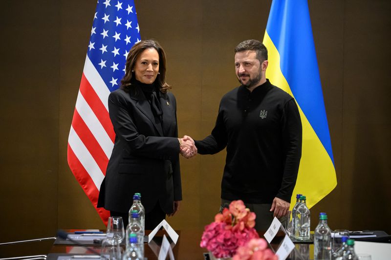 © Reuters. Vice President Kamala Harris of the United States (left) shakes hands with President Volodymyr Zelenskyy of Ukraine (right) as they meet for a bilateral talk during the Summit on peace in Ukraine, in Stansstad near Lucerne, Switzerland, Saturday, June 15, 2024. ALESSANDRO DELLA VALLE/Pool via REUTERS/File Photo