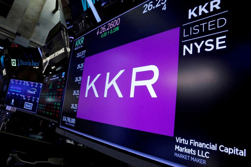 © Reuters. FILE PHOTO: Trading information for KKR & Co is displayed on a screen on the floor of the New York Stock Exchange (NYSE) in New York, U.S., August 23, 2018. REUTERS/Brendan McDermid/File Photo