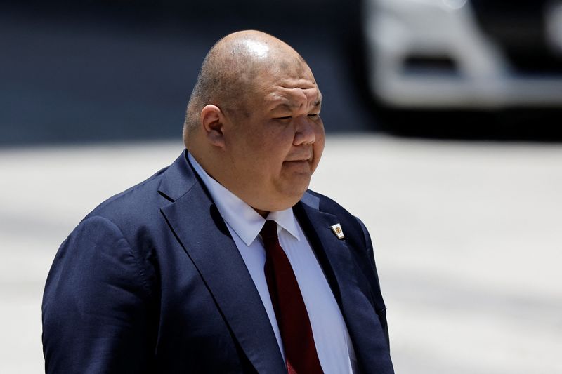 © Reuters. FILE PHOTO: Steven Cheung looks on outside the Wilkie D. Ferguson Jr. United States Courthouse, on the day of former U.S. President Donald Trump's arraignment on classified document charges, in Miami, Florida, U.S., June 13, 2023. REUTERS/Marco Bello/File Photo